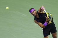 Rafael Nadal, of Spain, serves to Marin Cilic, of Croatia, during the fourth round of the U.S. Open tennis tournament Monday, Sept. 2, 2019, in New York. (AP Photo/Jason DeCrow)