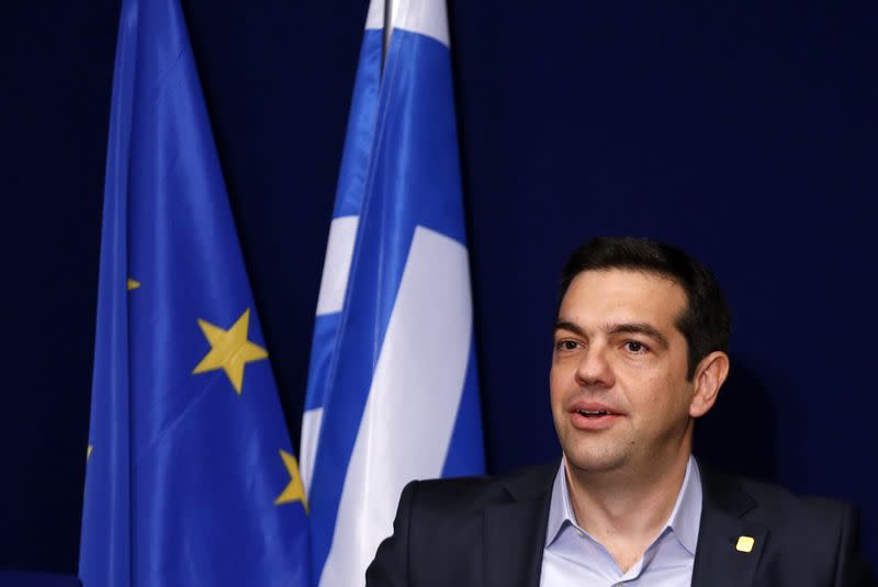 Greek Prime Minister Alexis Tsipras addresses a news conference after a European Union leaders summit in Brussels February 12, 2015. REUTERS/Francois Lenoir