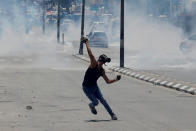 <p>A Palestinian protester hurls stones towards Israeli troops during clashes at a protest marking the 69th anniversary of Nakba, in the West Bank town of Bethlehem May 15, 2017. (Photo: Ammar Awad/Reuters) </p>