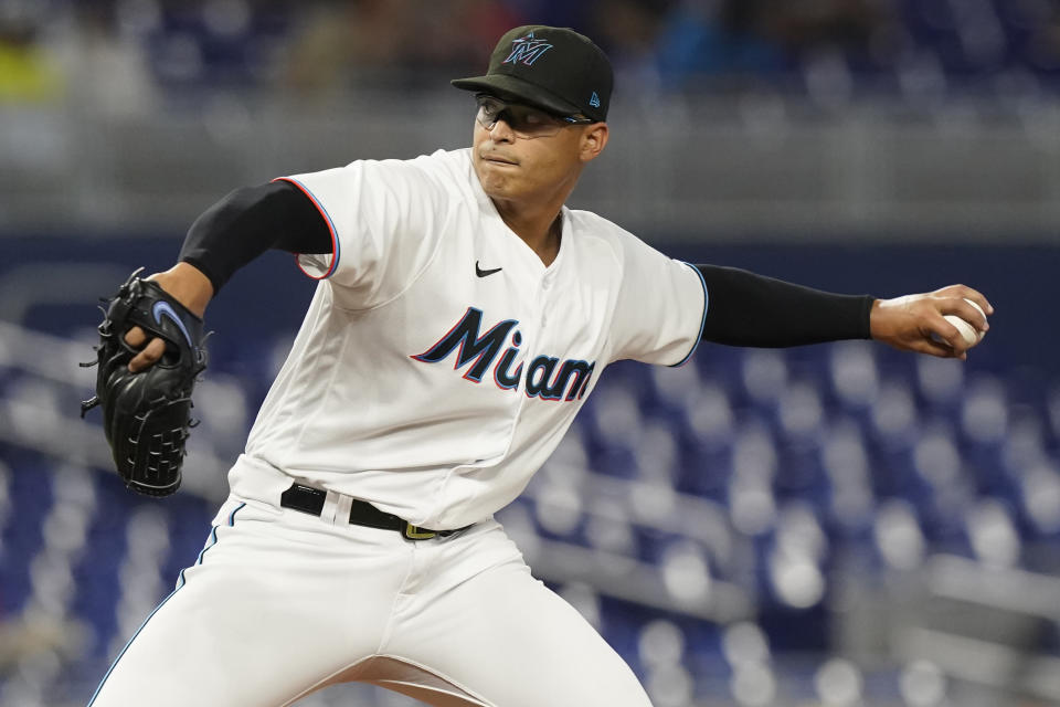 Miami Marlins starting pitcher Jesus Luzardo aims a pitch during the first inning of a baseball game against the Tampa Bay Rays, Tuesday, Aug. 30, 2022, in Miami. (AP Photo/Marta Lavandier)