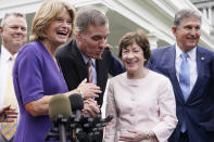 From left, Sen. Jon Tester, D-Mont., Sen. Lisa Murkowski, R-Alaska, Sen. Mark Warner, D-Va., Sen. Susan Collins, R-Maine, and Sen, Joe Manchin, D-W.Va., speak to the media after remarks by President Joe Biden, Thursday June 24, 2021, at the White House in Washington. Biden invited members of the group of 21 Republican and Democratic senators to discuss the infrastructure plan. (AP Photo/Jacquelyn Martin)