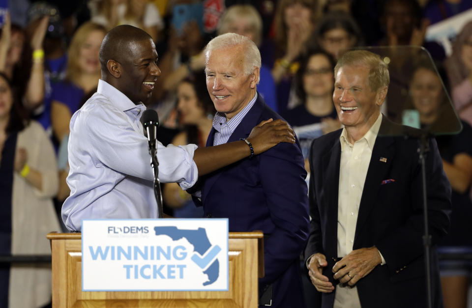 (From left) Florida Democratic gubernatorial candidate Andrew Gillum, former Vice President Joe Biden and Sen. Bill Nelson at a campaign rally for Gillum and Nelson on Oct. 22 in Tampa. Biden made his case for the two candidates and against President Donald Trump. (Photo: ASSOCIATED PRESS)