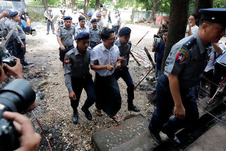 FILE PHOTO: Detained Reuters journalists Wa Lone and Kyaw Soe Oo arrive to listen to their verdict at Insein court in Yangon, Myanmar, September 3, 2018. REUTERS/Myat Thu Kyaw