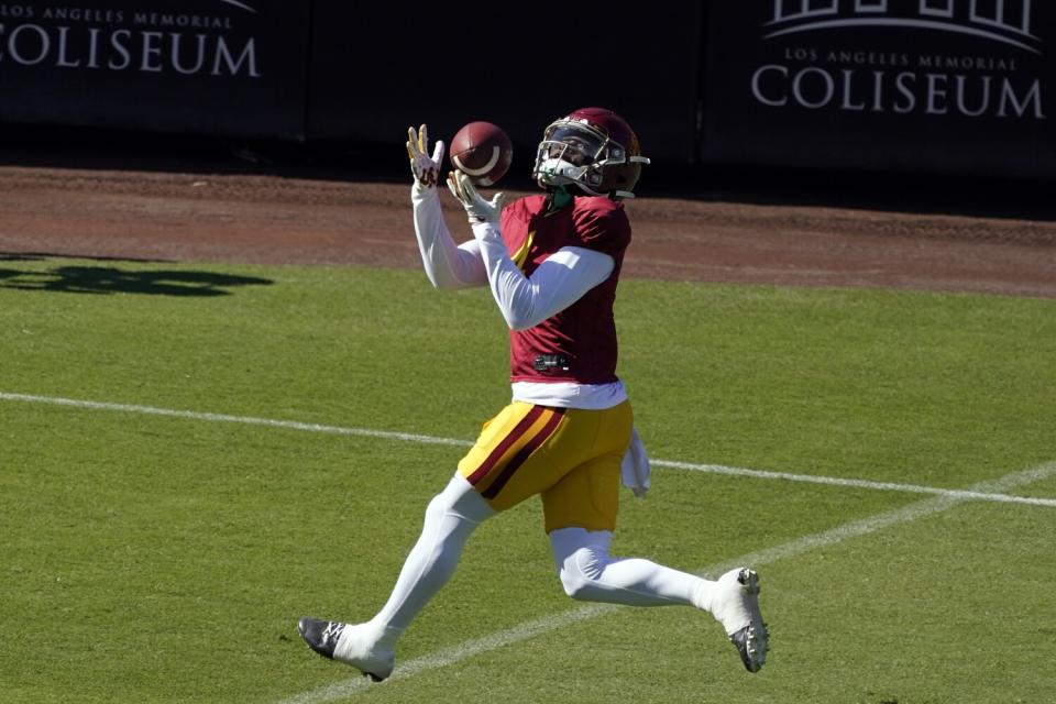 USC wide receiver Mario Williams makes a catch during spring practice