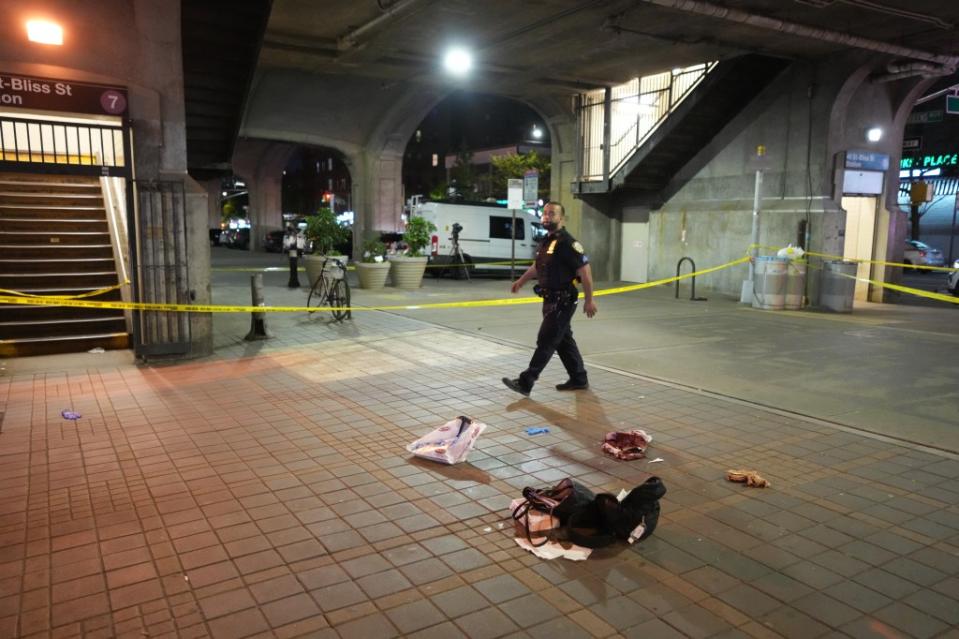 An NYPD officer on the scene of a stabbing at a Queens Boulevard subway station on May 8, 2024. James Keivom