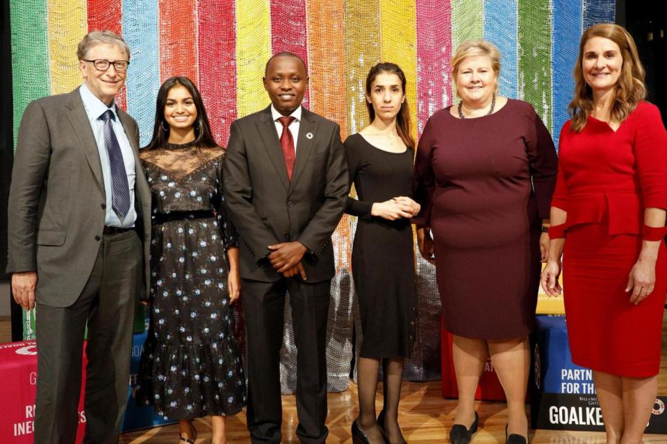 Amika George with Bill and Melinda Gates at The Goalkeepers 2018 Global Goals Awards (Getty Images)