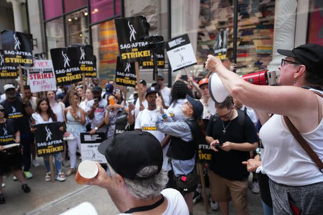 Writers and actors on strike on Monday in New York City.