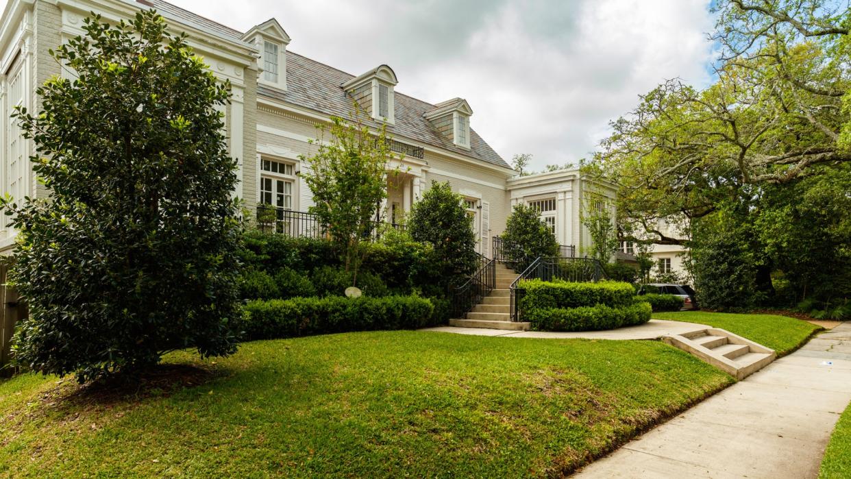 New Orleans, LA USA - April 21, 2016: Beautiful homes in the upscale historic Saint Charles Avenue area.