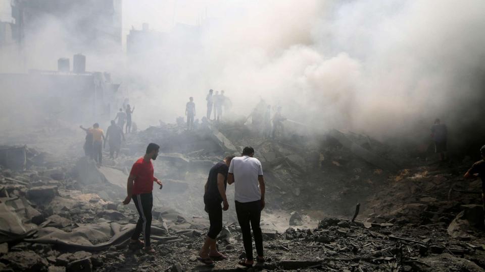 PHOTO: Palestinians look for survivors after an Israeli airstrike in Rafah refugee camp, southern Gaza Strip, Oct. 12, 2023. (Hatem Ali/AP)