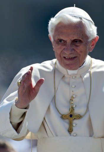 Pope Benedict XVI waves as he arrives with his popemobile in St. Peter's Square in the Vatican for his weekly general audience on Wednesday. The Vatican has issued a scathing condemnation of the main association of Catholic nuns in the United States for taking liberal stances on contraception, homosexuality and female priests