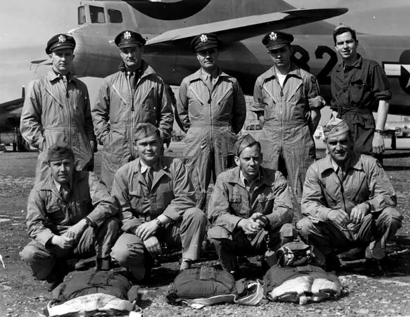 FILE PHOTO: Crew of the U.S. Army Air Forces B-29 bomber Enola Gay, which dropped the atomic bomb on the Japanese city of Hiroshima, pose in 1946