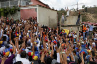 Opposition supporters attend a rally in support of political prisoners and against Venezuelan President Nicolas Maduro, outside the military prison of Ramo Verde, in Los Teques, Venezuela April 28, 2017. REUTERS/Marco Bello