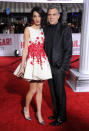 <p>For the L.A. premiere of “Hail, Caesar!” Amal kept things flirty on the red carpet in an appliquéd Giambattista Valli minidress.<i> (Photo by Gregg DeGuire/WireImage)</i></p>