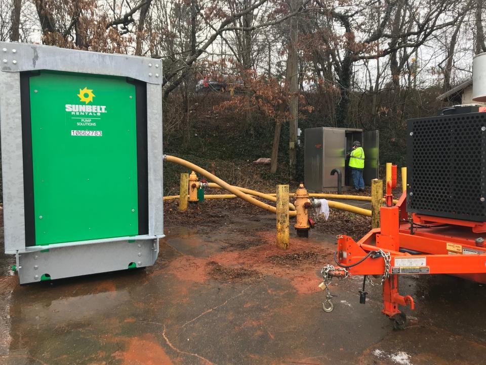 City of Asheville water resources crews have hooked a pump up to hydrants in Roger Farmer Memorial Park at 71 Deaverview Road on Dec. 30, 2022.