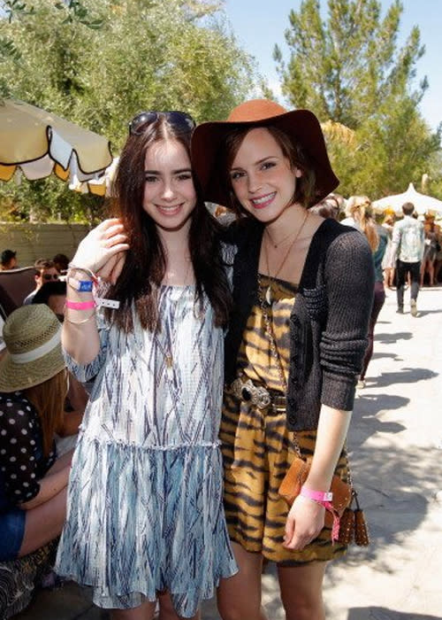 Brits Lily Collins (daughter of Phil Collins) and Harry Potter alum Emma Watson soak up the desert sunshine in breezy printed dresses and essential summer accessories at Mulberry's annual Coachella BBQ Pool Party at The Parker in Palm Springs near the festival. (Photo by Donato Sardella/WireImage)