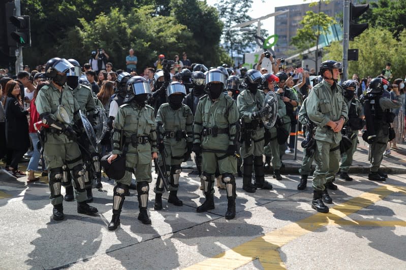 Hong Kong holds its breath ahead of polls amid a lull in violence