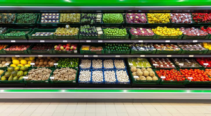 Fresh fruits and vegetables on the shelf in the supermarket