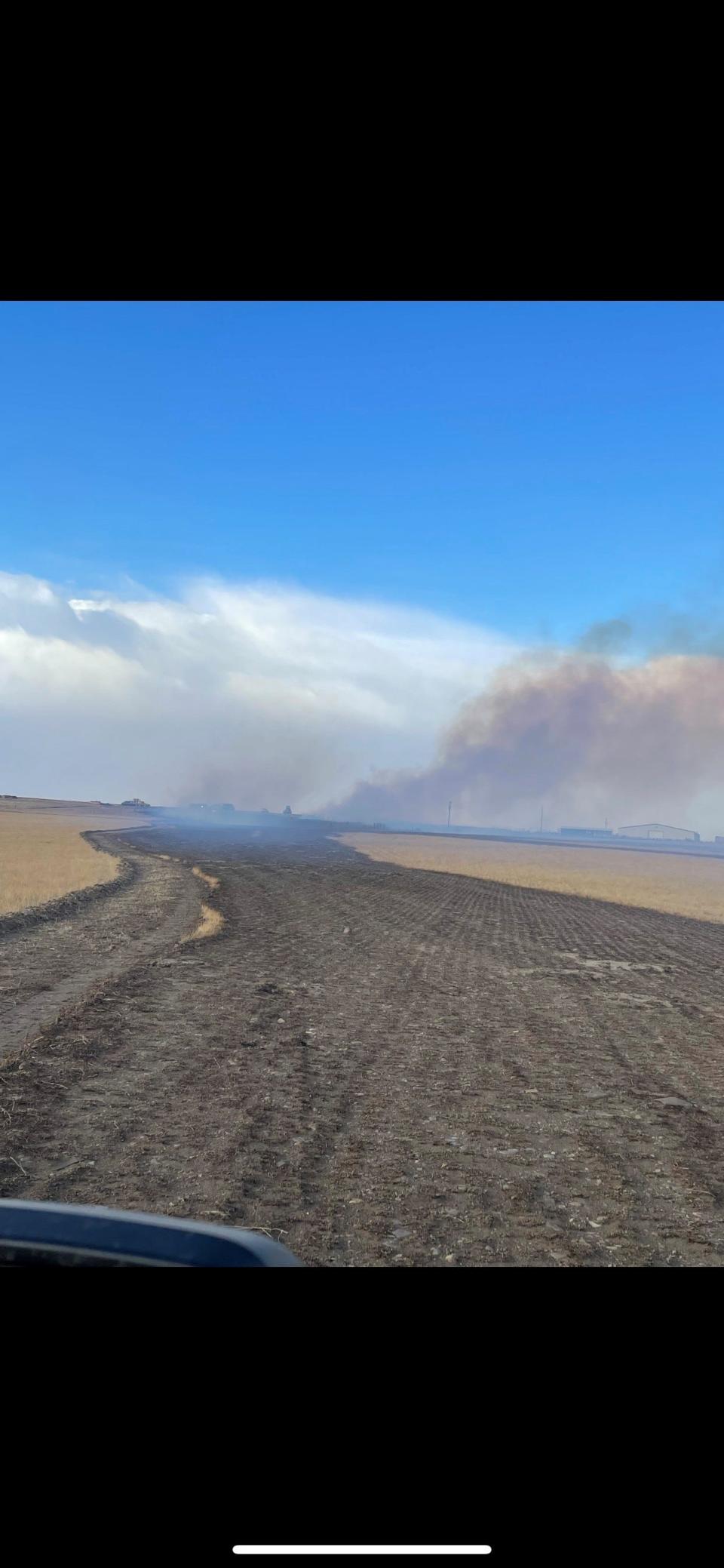 A fire has burned between 400 and 500 acres east of Browning.