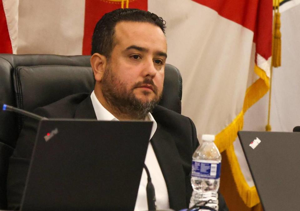 Affordable Housing Task Force member Alex Ruiz listens as Mayor Bovo addresses the committee. The City of Hialeah held its press conference and Affordable Housing Task Force meeting at City Hall on Monday, January 29, 2024 in Hialeah, Florida. Carl Juste/cjuste@miamiherald.com