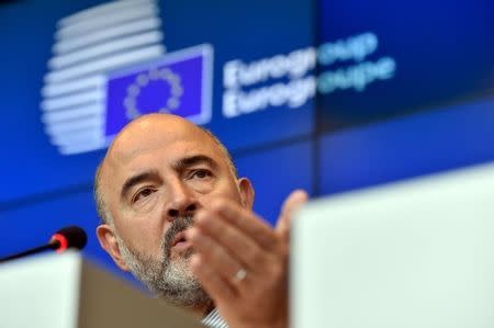 European Economic and Financial Affairs Commissioner Pierre Moscovici attends a news conference after an eurozone finance ministers meeting (Eurogroup) in Luxembourg, October 5, 2015. REUTERS/Eric Vidal - RTS34XU