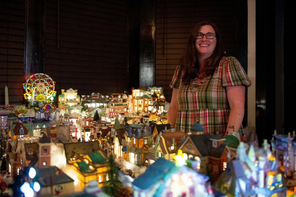 Tyger Glauser Nicholas has an extensive Christmas village in her Old North Knoxville home. The pieces are specific to Knoxville and remind her of friends and family.