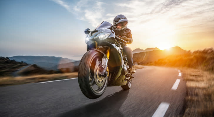 Man going fast on a motorcycle