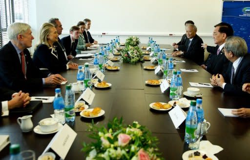 US Secretary of State Hillary Clinton (2nd L) during a bilateral meeting with Taiwanese special envoy Lien Chan (2nd L) at the APEC summit in Russia on September 9. A draft of the statement to be released after the summit reflected worries over the impact of Europe's debt crisis on growth in the APEC region