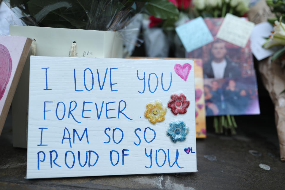 Floral tributes for victims of the terrorist attack, including Jack Merritt, left on London Bridge in central London, after a terrorist wearing a fake suicide vest who went on a knife rampage killing two people, was shot dead by police on Friday.