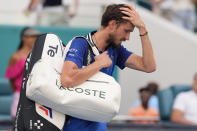 Daniil Medvedev, of Russia, walks off the court after losing to Jannik Sinner, of Italy, in a semifinal match at the Miami Open tennis tournament, Friday, March 29, 2024, in Miami Gardens, Fla. (AP Photo/Lynne Sladky)