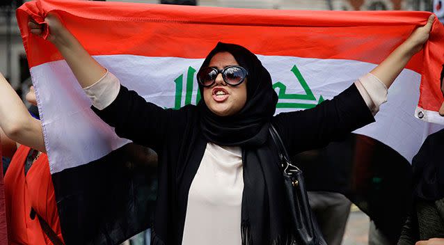 An Iraqi protestor outside the Queen Elizabeth II Conference Centre, London. Source: AAP