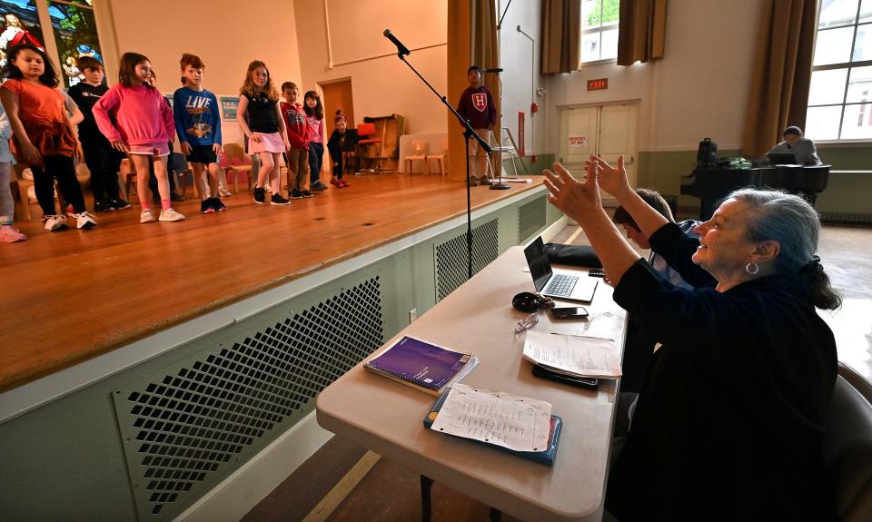 Dance director Jo Ann Warren offers direction during rehearsal for an upcoming performance at the T.E.C. Schools at Trinity Lutheran Church in Worcester.