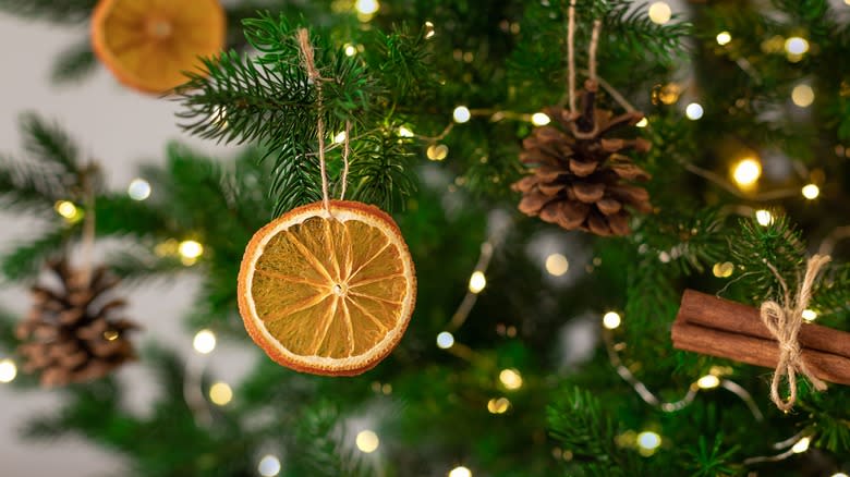 oranges hanging from christmas tree