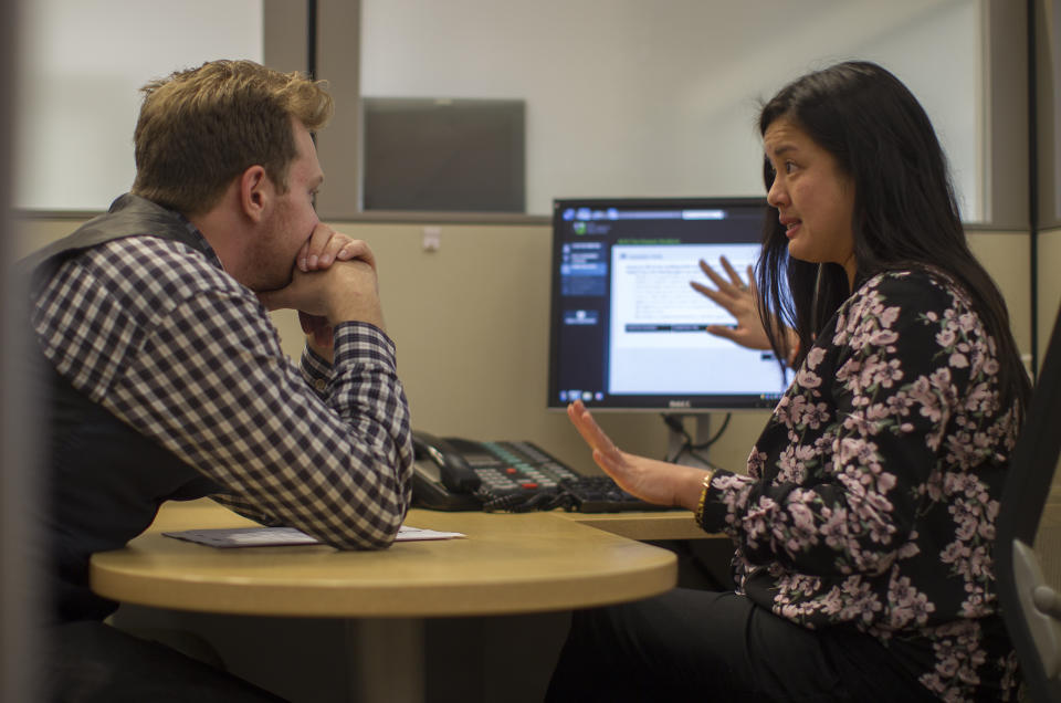 Client Paul Chirico of Los Angeles works with tax preparer Erika Arbulante at H&R Block in Los Angeles, California.  (Credit: Gina Ferazzi/Los Angeles Times via Getty Images