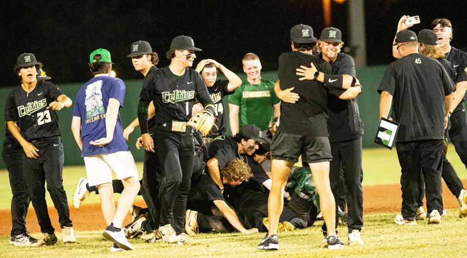 Members of the St. John Neumann baseball team react after beating Canterbury in the Class 2A-Region 3 championship  at Terry Park on Monday, May 15, 2023. St. John Neumann won 9-4 and moves on to the final four at Hammond Stadium.