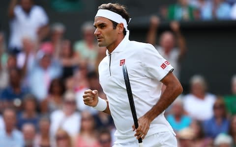  Roger Federer of Switzerland celebrates winning the first set in his Men's Singles semi-final match against Rafael Nadal of Spain d - Credit: &nbsp;Clive Brunskill/Getty Images