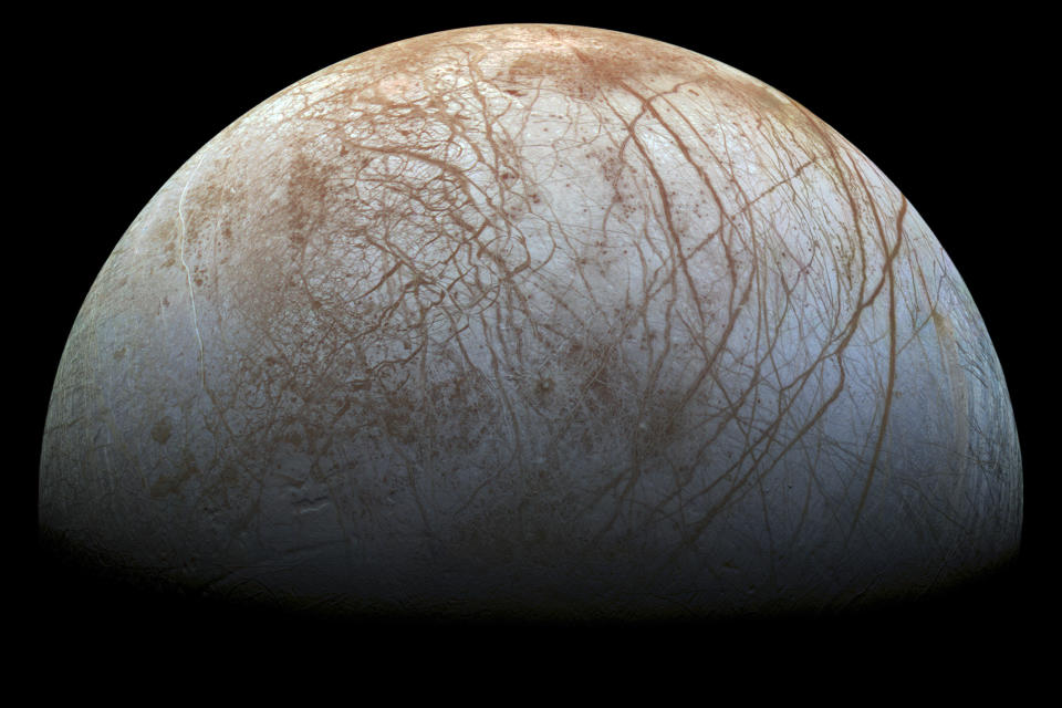 This image made available by NASA in 2014 shows Jupiter's icy moon Europa in a reprocessed color view, made from images captured by NASA's Galileo spacecraft in the late 1990s. NASA’s Juno spacecraft made the closest approach to Jupiter’s tantalizing, icy moon Europa in more than 20 years on Thursday, Sept. 29, 2022. (NASA/JPL-Caltech/SETI Institute via AP)