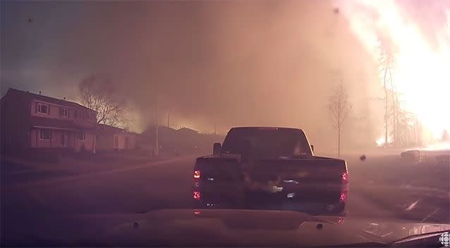 The residents of Fort McMurray line up trying evacuate the town. Photo: YouTube