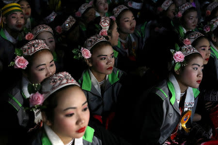 FILE PHOTO: Dancers wait for their turn to perform during the 70th anniversary of Karen National Revolution Day in Kaw Thoo Lei, Kayin state, Myanmar January 30, 2019. Picture taken January 30, 2019. REUTERS/Ann Wang/File Photo