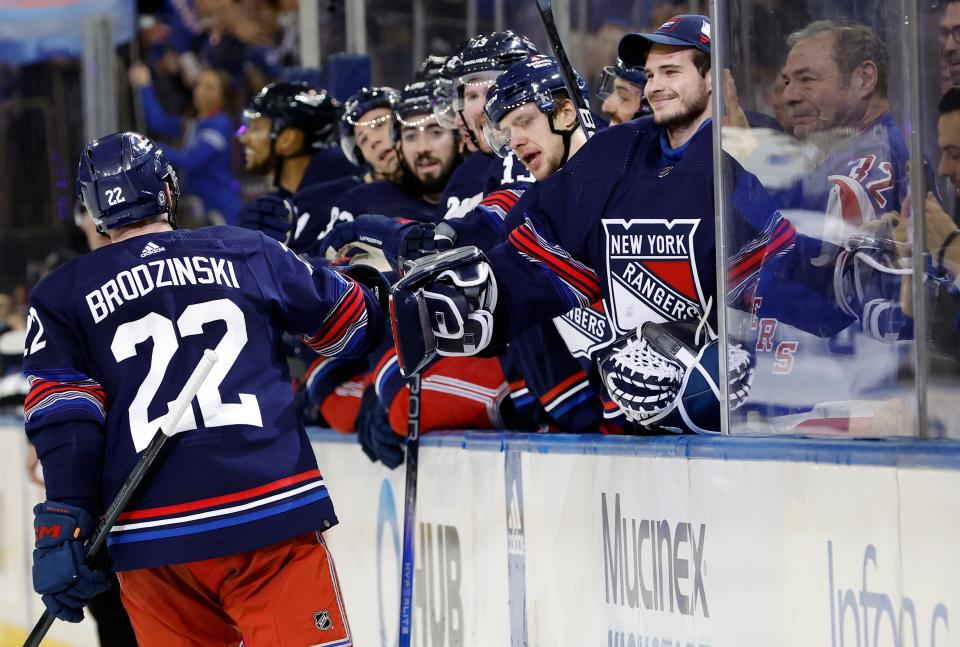 NEW YORK, NEW YORK - FEBRUARY 07: Igor Shesterkin #31 celebrates with Jonny Brodzinski #22 of the New York Rangers after Brodzinski's goal during the second period against the Tampa Bay Lightning at Madison Square Garden on February 07, 2024 in New York City.