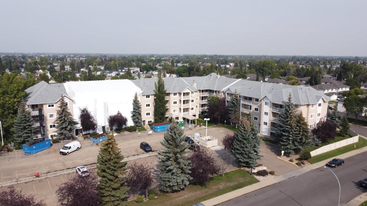 Engineers investigating the damage caused by a March 12 fire discovered the Castledowns Pointe building was not structurally sound.  (David Bajer/CBC - image credit)