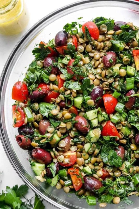 <p>A Pinch of Healthy</p><p>Lentil salad is a perfect side dish or light meal that everyone can enjoy! This one would be great for all the spring and summer potlucks and cookouts, and it happens to be vegan friendly.</p><p><strong>Get the recipe: <a href="https://www.apinchofhealthy.com/lentil-salad/" rel="nofollow noopener" target="_blank" data-ylk="slk:Lentil Salad;elm:context_link;itc:0;sec:content-canvas" class="link ">Lentil Salad</a></strong></p>