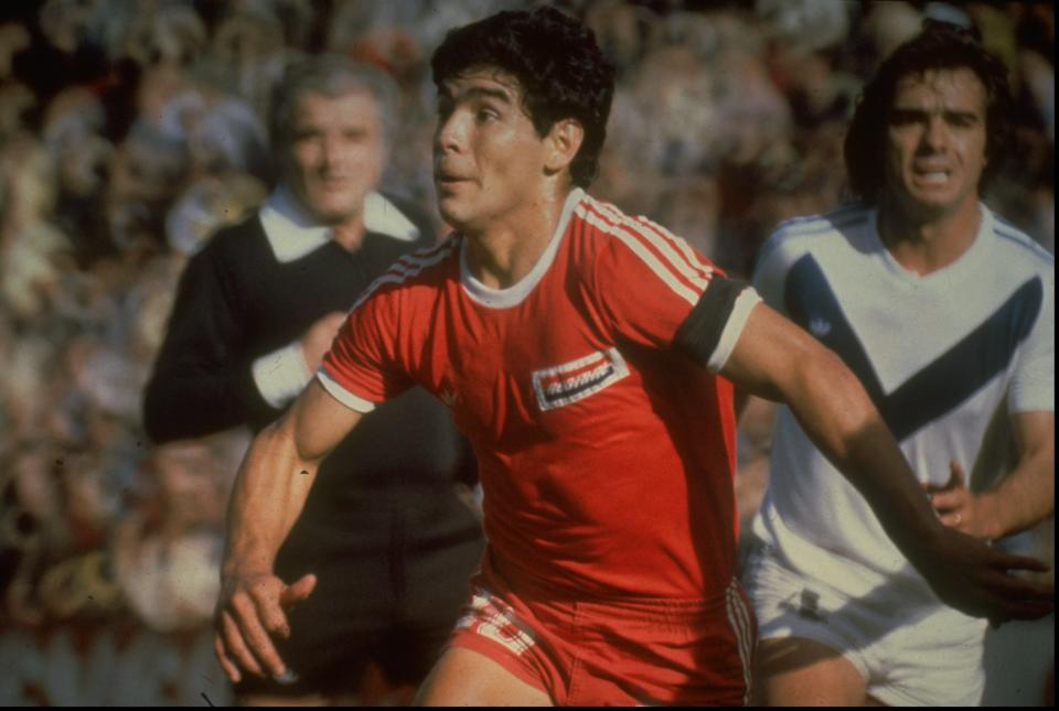 Diego Maradona (center) of Argentina is shown in action during a match for Argentinos Juniors in Argentina. (Mandatory Credit: Allsport UK /Allsport)