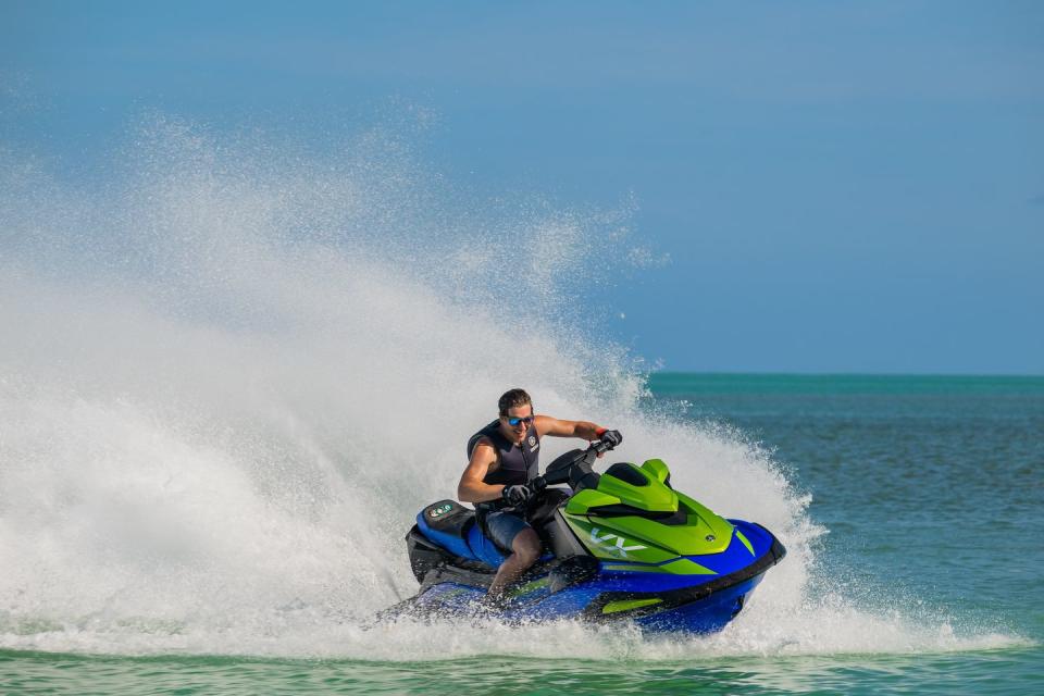 a man riding a waverunner