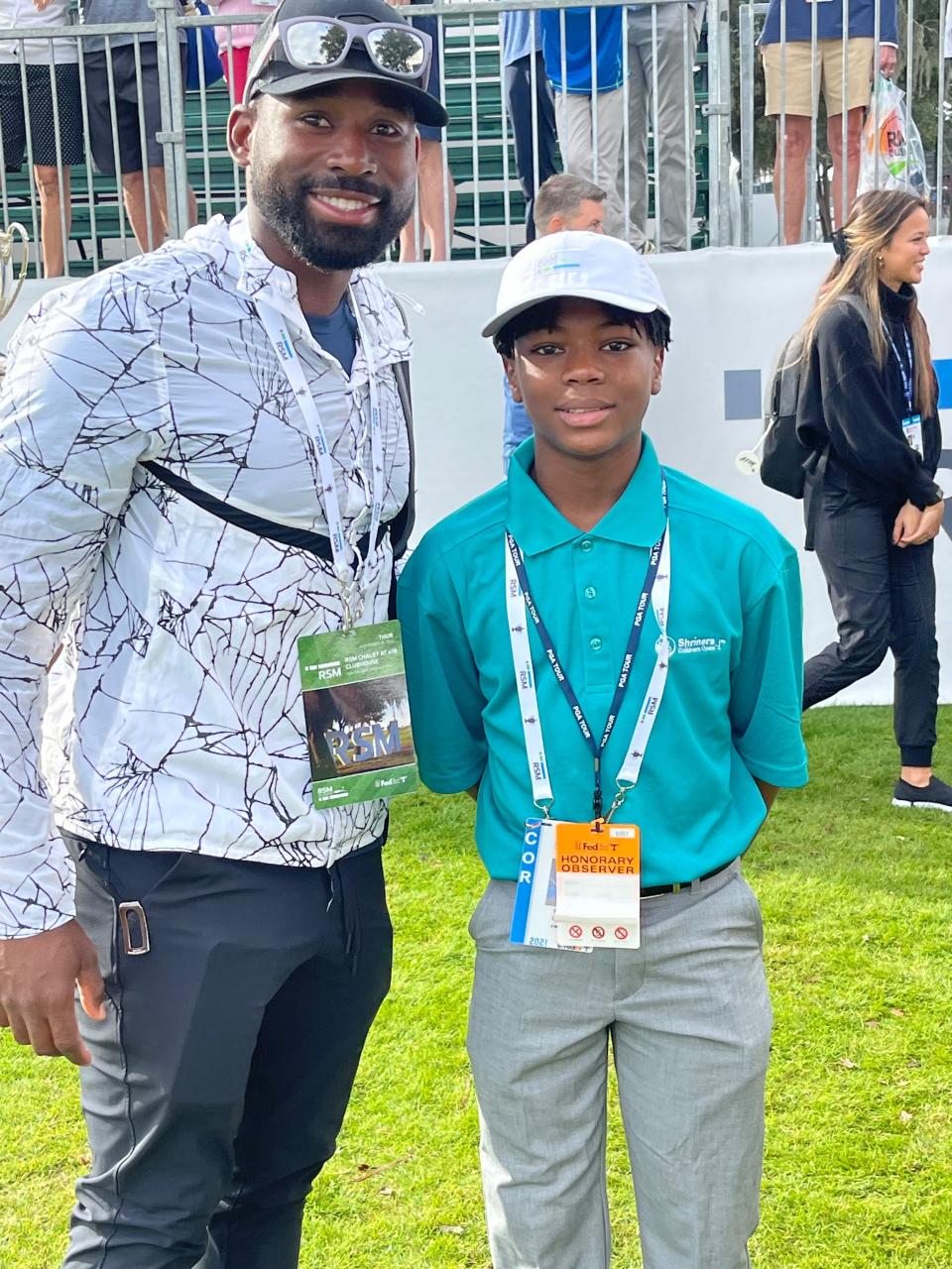 Parker Dunkin, right, met Jackie Bradley Jr., during the RSM Classic golf tournament on Thursday.