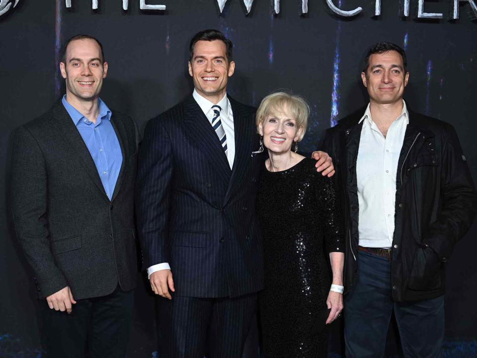 <p>Karwai Tang/WireImage</p> Henry Cavill with mother Marianne Cavill, and brothers attend the World Premiere of "The Witcher: Season 2"