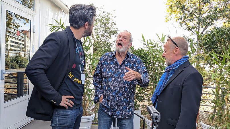 Terry Gilliam with Euronews Culture&apos;s David Mouriquand (left) and Fred Ponsard (right)