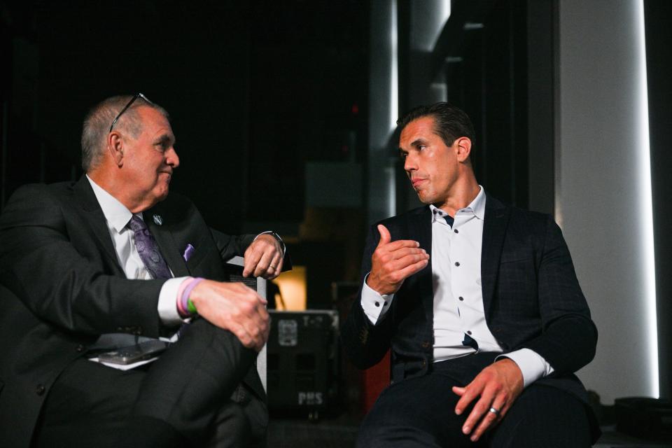 Brady Quinn, right, played in the Joel Cornette Foundation golf tournament at Coldstream Country Club July 31. Now with Fox Sports, Quinn talked about UC joining the Big 12.