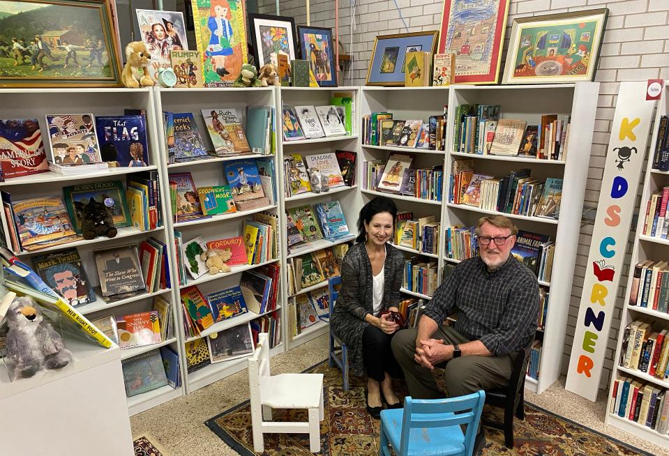 NewSouth Bookstore co-owners Suzanne La Rosa and Randall Williams sit in the children's book section that's part of a new store extension.