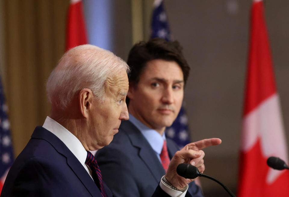 U.S. President Joe Biden points a finger as he delivers remarks next to Canadian Prime Minister Justin Trudeau in Ottawa, Ontario, Canada March 24, 2023. REUTERS/Patrick Doyle