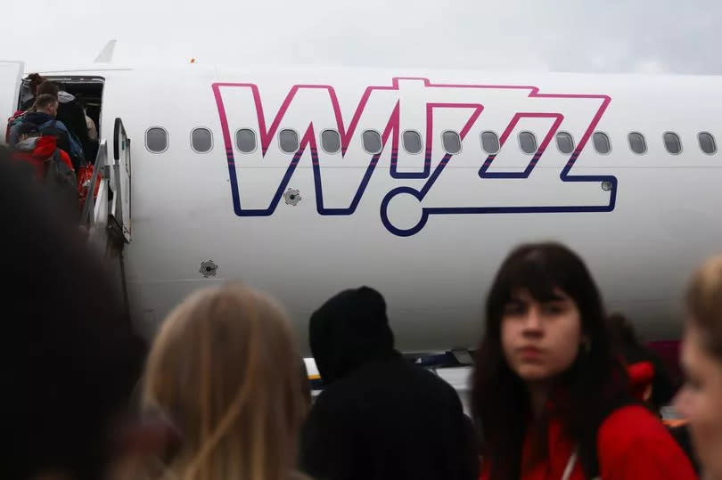 People board Wizz Air plane on the airport in Katowice, Poland on February 28, 2024. (Photo by Jakub Porzycki/NurPhoto via Getty Images)